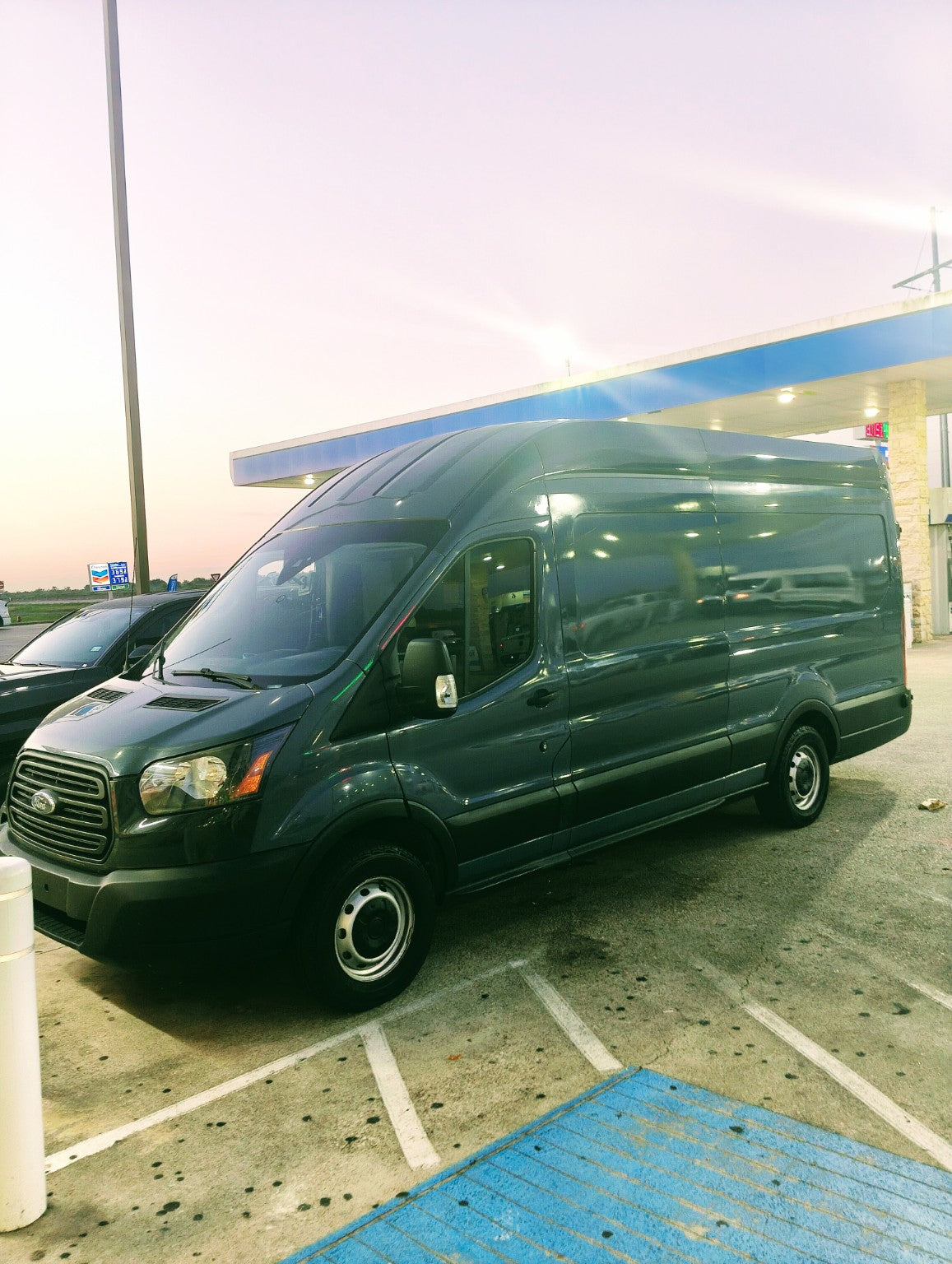 ASP Moving USA cargo van on the road