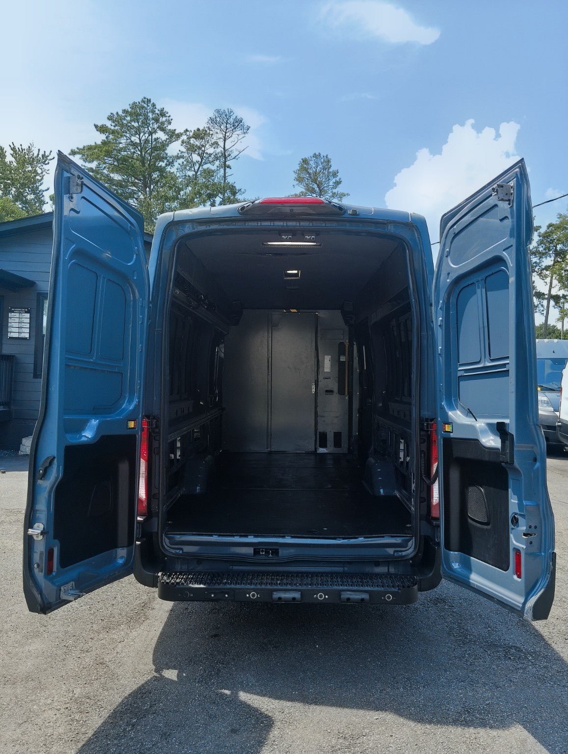 Open rear cargo area of ASP Moving USA van